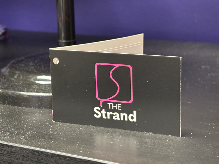 The Strand branded card outside